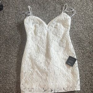 Lulu's White Sleeveless Mini Dress with Sweetheart Neckline